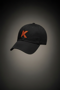 Casquette KANNHAPP noir logo K orange vue de côté